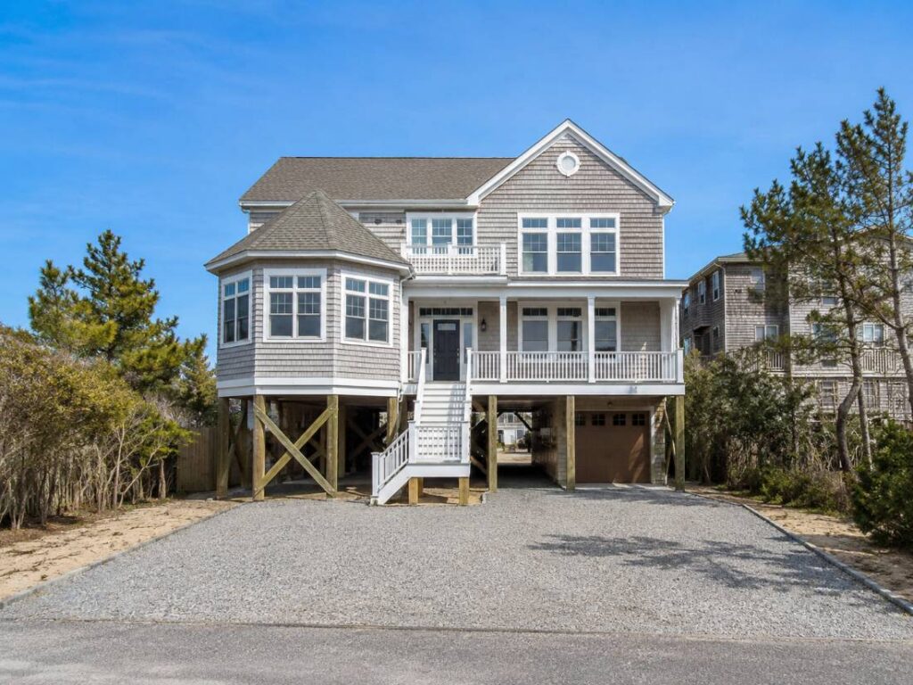 Elevated coastal home showing house raising construction in Brick NJ